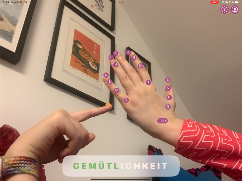Back of a hand with letter positions